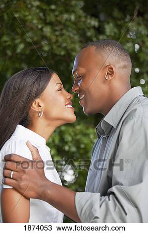 Stock Image - fort lauderdale, florida, united states of america; a couple looking at each other. Fotosearch