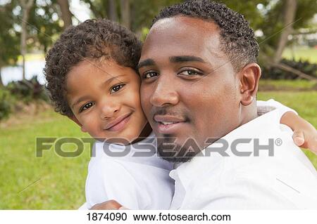 Stock Image - fort lauderdale, florida, united states of america; a father and his son. Fotosearch