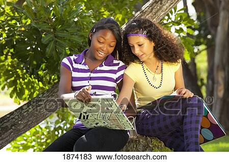 fort lauderdale, florida, united states of america; two teenage girls doing school work in the park View Large Photo Image Stock Image - fort lauderdale, florida, united states of america; two teenage girls doing school work in the park. Fotosearch