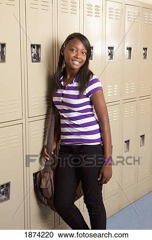 fort lauderdale, florida, united states of america; a teenage girl standing in a school hallway View Large Photo Image Stock Image - fort lauderdale, florida, united states of america; a teenage girl standing in a school hallway. Fotosearch