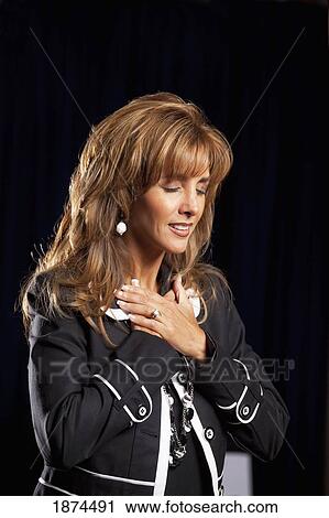 fort lauderdale, florida, united states of america; a woman in a stance of worship View Large Photo Image Stock Image - fort lauderdale, florida, united states of america; a woman in a stance of worship. Fotosearch