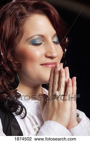 fort lauderdale, florida, united states of america; a woman focused on worship View Large Photo Image Stock Image - fort lauderdale, florida, united states of america; a woman focused on worship. Fotosearch