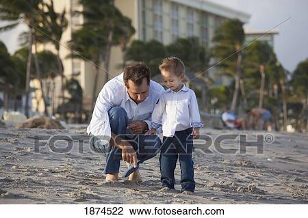 fort lauderdale, florida, united states of america; a father on the beach with his son View Large Photo Image Stock Image - fort lauderdale, florida, united states of america; a father on the beach with his son. Fotosearch