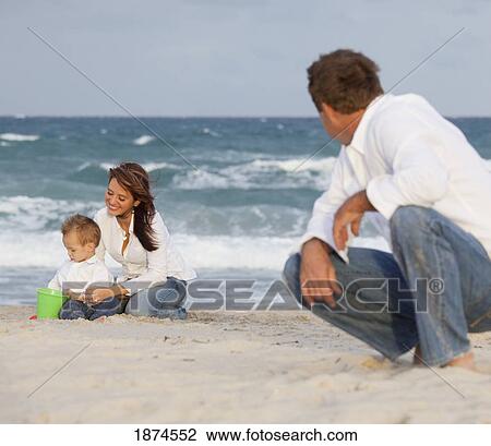 fort lauderdale, florida, united states of america; a man watching his family on the beach View Large Photo Image Stock Image - fort lauderdale, florida, united states of america; a man watching his family on the beach. Fotosearch