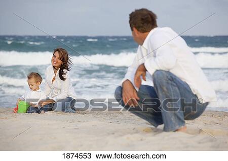 fort lauderdale, florida, united states of america; a man watching his family on the beach View Large Photo Image Stock Image - fort lauderdale, florida, united states of america; a man watching his family on the beach. Fotosearch