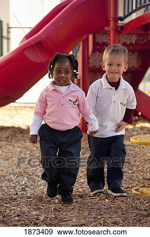 fort lauderdale, florida, united states of america; two young children playing at a playground View Large Photo Image Stock Photo - fort lauderdale, florida, united states of america; two young children playing at a playground. Fotosearch