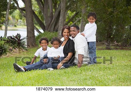 fort lauderdale, florida, united states of america; a family portrait in the park View Large Photo Image Stock Photo - fort lauderdale, florida, united states of america; a family portrait in the park. Fotosearch