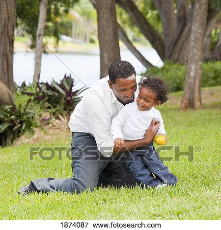 fort lauderdale, florida, united states of america; a father playing with his young son View Large Photo Image Stock Photo - fort lauderdale, florida, united states of america; a father playing with his young son. Fotosearch