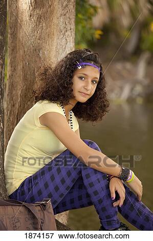 fort lauderdale, florida, united states of america; a girl sitting under a tree View Large Photo Image Stock Photo - fort lauderdale, florida, united states of america; a girl sitting under a tree. Fotosearch