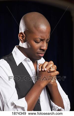 fort lauderdale, florida, united states of america; a man with head bowed, eyes closed and hands clasped in prayer View Large Photo Image Stock Photo - fort lauderdale, florida, united states of america; a man with head bowed, eyes closed and hands clasped in prayer. Fotosearch
