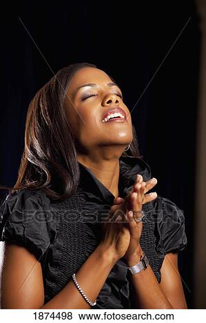 fort lauderdale, florida, united states of america; a woman singing in worship View Large Photo Image Stock Photo - fort lauderdale, florida, united states of america; a woman singing in worship. Fotosearch