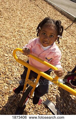 fort lauderdale, florida, united states of america; a young girl playing at a playground View Large Photo Image Stock Photograph - fort lauderdale, florida, united states of america; a young girl playing at a playground. Fotosearch