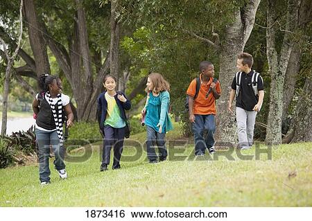 Stock Photograph - fort lauderdale, florida, united states of america; a group of preteen students walking together. Fotosearch