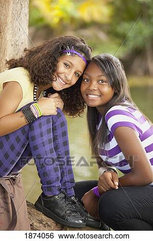 fort lauderdale, florida, united states of america; two teenage girls together in a park View Large Photo Image Stock Photograph - fort lauderdale, florida, united states of america; two teenage girls together in a park. Fotosearch