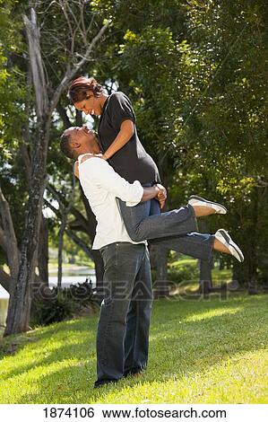 fort lauderdale, florida, united states of america; a couple having fun together in a park View Large Photo Image Stock Photograph - fort lauderdale, florida, united states of america; a couple having fun together in a park. Fotosearch