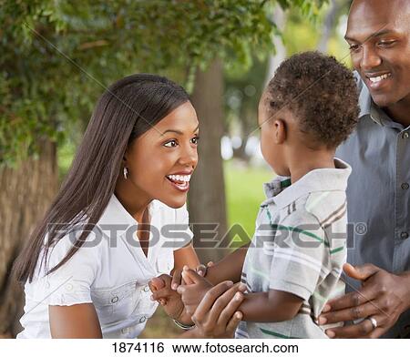 fort lauderdale, florida, united states of america; a mother and father with their young son View Large Photo Image Stock Photograph - fort lauderdale, florida, united states of america; a mother and father with their young son. Fotosearch
