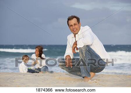 fort lauderdale, florida, united states of america; a family on the beach View Large Photo Image Stock Photograph - fort lauderdale, florida, united states of america; a family on the beach. Fotosearch