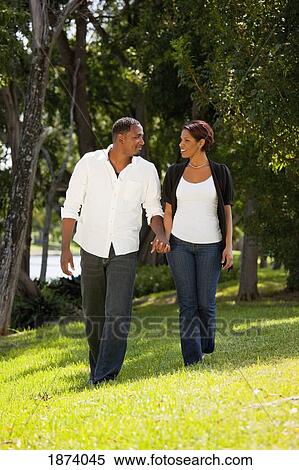 fort lauderdale, florida, united states of america; a couple walking in a park View Large Photo Image Stock Photography - fort lauderdale, florida, united states of america; a couple walking in a park. Fotosearch