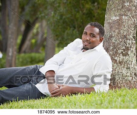 fort lauderdale, florida, united states of america; portrait of a man in a park View Large Photo Image Stock Photography - fort lauderdale, florida, united states of america; portrait of a man in a park. Fotosearch