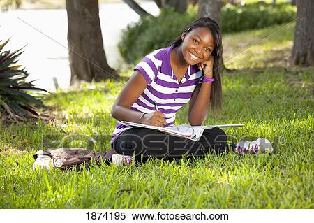 fort lauderdale, florida, united states of america; a teenage girl doing school work in the park View Large Photo Image Stock Photography - fort lauderdale, florida, united states of america; a teenage girl doing school work in the park. Fotosearch