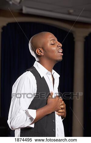 fort lauderdale, florida, united states of america; a man singing in worship View Large Photo Image Stock Photography - fort lauderdale, florida, united states of america; a man singing in worship. Fotosearch