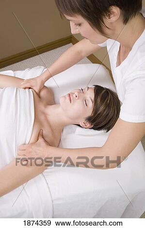 getting a massage from a massage therapist View Large Photo Image Stock Photo - getting a massage from a massage therapist. Fotosearch