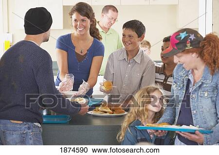 Group of people at community buffet View Large Photo Image Stock Image - Group of people at community buffet. Fotosearch