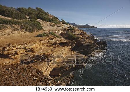 Stock Photo - hawaii, united states of america; rugged section of the southeastern shore of kauai. Fotosearch