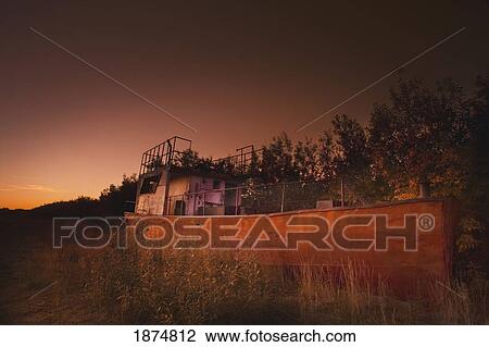 inuvik, northwest territories, canada; an abandoned ship on the riverbank View Large Photo Image Stock Image - inuvik, northwest territories, canada; an abandoned ship on the riverbank. Fotosearch