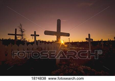 inuvik, northwest territories, canada; cemetery in the arctic at sunset View Large Photo Image Stock Photo - inuvik, northwest territories, canada; cemetery in the arctic at sunset. Fotosearch