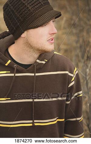 jasper national park, alberta, canada; a young man wearing a hat View Large Photo Image Stock Image - jasper national park, alberta, canada; a young man wearing a hat. Fotosearch