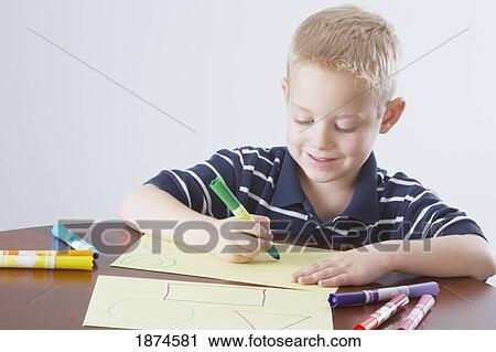 knoxville, tennessee, united states of america; a boy coloring at a table View Large Photo Image Stock Image - knoxville, tennessee, united states of america; a boy coloring at a table. Fotosearch
