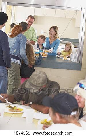 knoxville, tennessee, united states of america; a family serving a meal to those in need View Large Photo Image Stock Photography - knoxville, tennessee, united states of america; a family serving a meal to those in need. Fotosearch