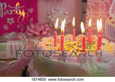 knoxville, tennessee, united states of america; candles lit on a birthday cake View Large Photo Image Stock Photography - knoxville, tennessee, united states of america; candles lit on a birthday cake. Fotosearch