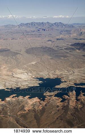 las vegas, nevada, united states of america; aerial view of desert, river and mountains with snow capped mountains in background View Large Photo Image Stock Photo - las vegas, nevada, united states of america; aerial view of desert, river and mountains with snow capped mountains in background. Fotosearch