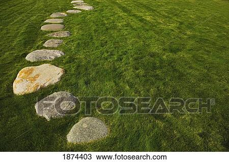 lethbridge, alberta, canada; a rock path through the grass View Large Photo Image Stock Image - lethbridge, alberta, canada; a rock path through the grass. Fotosearch