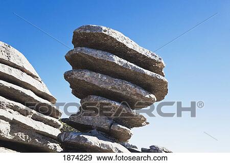 Stock Photo - malaga, spain; karstic rock formation known as el tornillo de el torcal (the screw of el torcal) in el torcal park nature reserve near antequera. Fotosearch