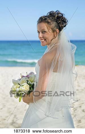 mayan riviera, akumal, mexico; a bride on the beach at gran bahia principe tulum all-inclusive resort View Large Photo Image Stock Photo - mayan riviera, akumal, mexico; a bride on the beach at gran bahia principe tulum all-inclusive resort. Fotosearch