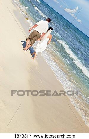 mayan riviera, akumal, mexico; bride and groom on the beach at gran bahia principe tulum all-inclusive resort View Large Photo Image Stock Photo - mayan riviera, akumal, mexico; bride and groom on the beach at gran bahia principe tulum all-inclusive resort. Fotosearch