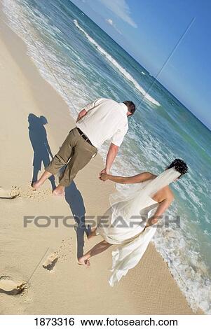 mayan riviera, akumal, mexico; bride and groom on the beach at gran bahia principe tulum all-inclusive resort View Large Photo Image Stock Photograph - mayan riviera, akumal, mexico; bride and groom on the beach at gran bahia principe tulum all-inclusive resort. Fotosearch