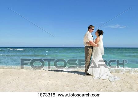 mayan riviera, akumal, mexico; bride and groom on the beach at gran bahia principe tulum all-inclusive resort View Large Photo Image Stock Photography - mayan riviera, akumal, mexico; bride and groom on the beach at gran bahia principe tulum all-inclusive resort. Fotosearch