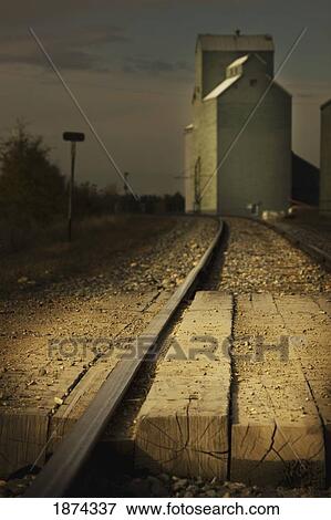 mayerthorpe, alberta, canada; grain elevator along train tracks View Large Photo Image Stock Photo - mayerthorpe, alberta, canada; grain elevator along train tracks. Fotosearch