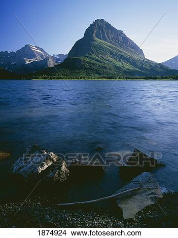 Picture - montana, united states of america; grinnell point and swiftcurrent lake in glacier national park. Fotosearch