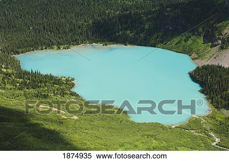 montana, united states of america; glacial silt pouring into grinnell lake at glacier national park View Large Photo Image Stock Photography - montana, united states of america; glacial silt pouring into grinnell lake at glacier national park. Fotosearch