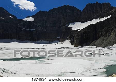 montana, united states of america; the name "alex" carved into the surface of grinnell glacier in glacier national park View Large Photo Image Picture - montana, united states of america; the name "alex" carved into the surface of grinnell glacier in glacier national park. Fotosearch