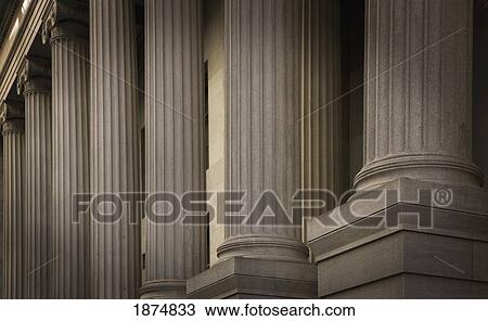 Stock Image - new york city, new york, united states of america; stone pillars on a building. Fotosearch