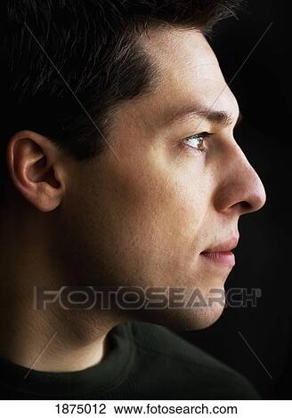 Stock Image - profile of a young man. Fotosearch