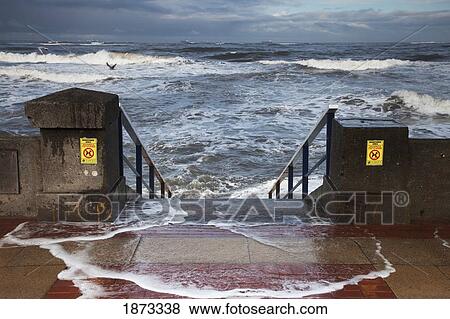 saltburn, teesside, england; waves crashing on the stairs leading down to the ocean View Large Photo Image Stock Photo - saltburn, teesside, england; waves crashing on the stairs leading down to the ocean. Fotosearch