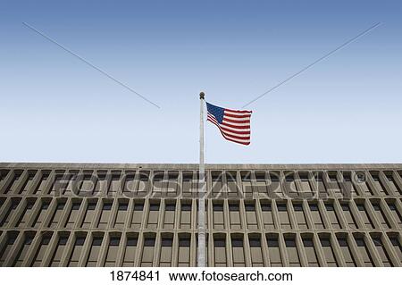san antonio, texas, united states of america; american flag in front of a building View Large Photo Image Stock Image - san antonio, texas, united states of america; american flag in front of a building. Fotosearch