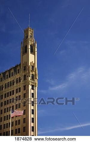 san antonio, texas, united states of america; an american flag in front of a building View Large Photo Image Stock Photo - san antonio, texas, united states of america; an american flag in front of a building. Fotosearch